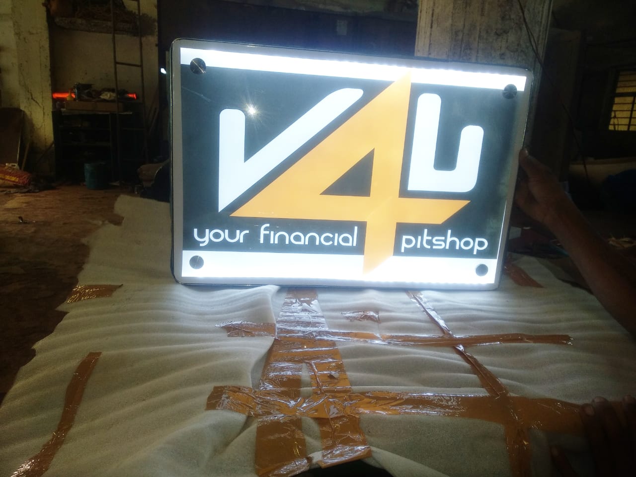 V4U store sign metal fabrication